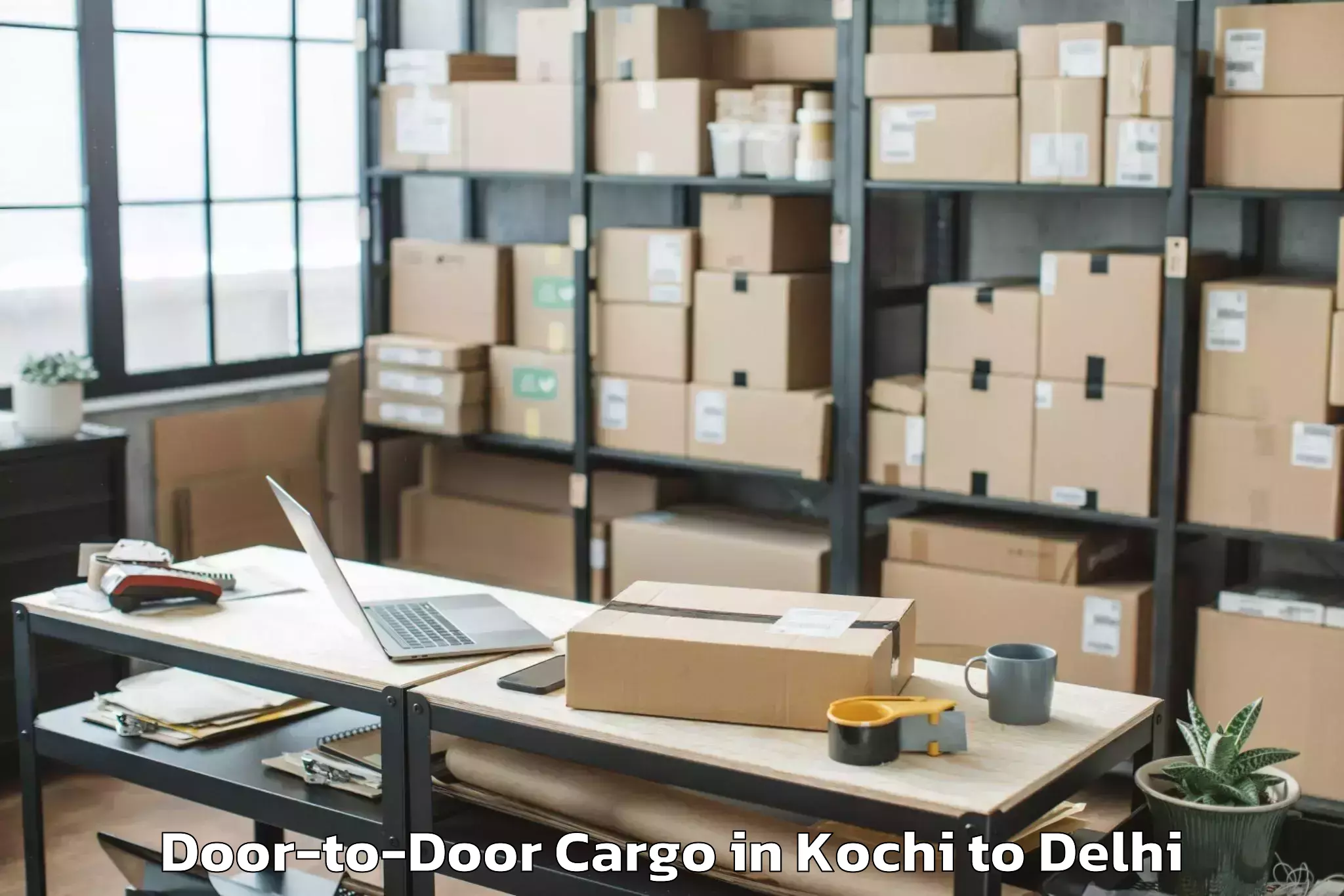 Top Kochi to Aggarwal City Mall Pitampura Door To Door Cargo Available